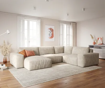 A modern living room with a large sectional sofa.