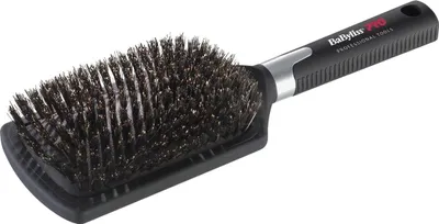 A black paddle brush with natural bristles is shown against a white background.