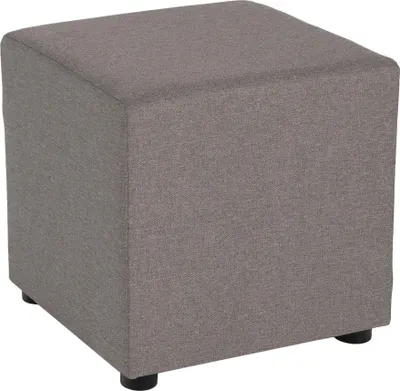 A single cube-shaped ottoman is shown from a slightly elevated angle against a white background.