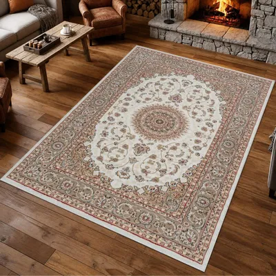 Imagen del producto de Alfombra color crema beige con un motivo floral central y un borde discreto. Tamaño: 80 x 150 cm