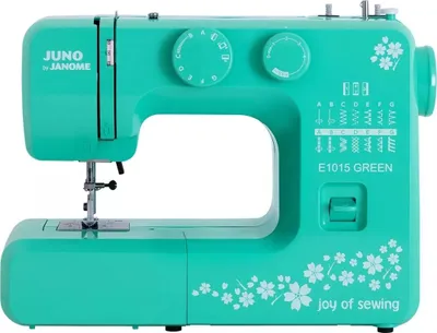A studio shot of a green sewing machine.