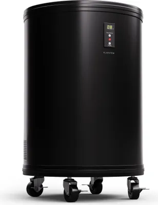 A black cylindrical mini-fridge with a digital display and wheels.