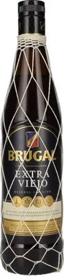 A bottle of Brugal Extra Viejo rum, presented in a net bag.