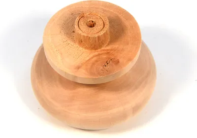 A wooden furniture foot is shown against a white background.
