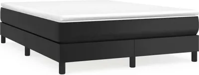 A black bed frame with a white mattress topper on a white background.