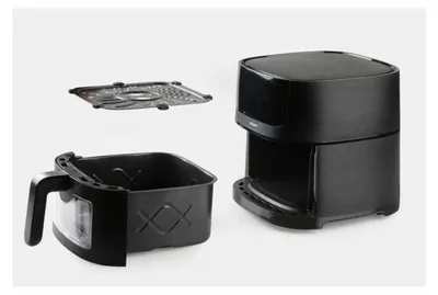 A black air fryer and its accessories are displayed against a light gray background.