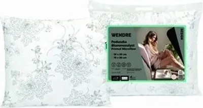 A pillow in its packaging, with a model shown on the packaging.