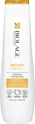A white bottle of Biolage Smoothproof Shampoo with gold accents and text.