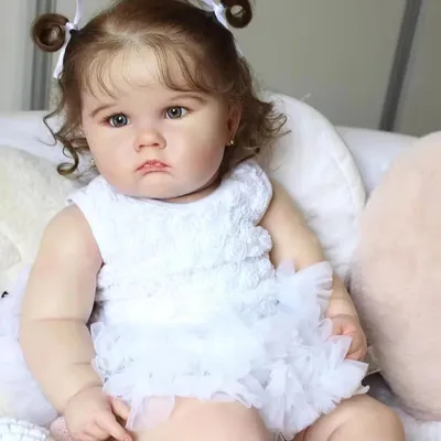 Imagen del producto de Muñeca realista para bebés, 61 cm, ojos azules, cabello rizado, ideal para niños