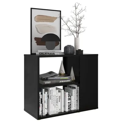 A black side table with books and decorative items on and inside it, presented against a white background.