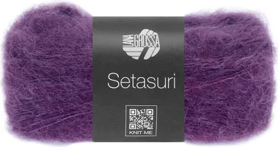 A ball of purple yarn with a black label.