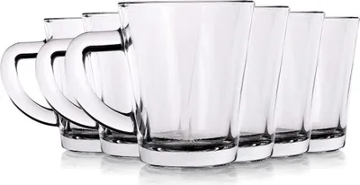 A group of clear glass mugs are arranged in a line against a white background.