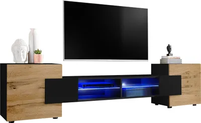A modern TV stand with integrated lighting, displaying a television.