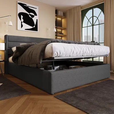 A bedroom scene with a large bed, artwork on the wall, and a window with curtains.