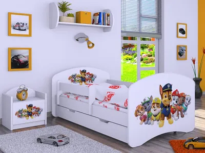 A child's bedroom with a bed and nightstand decorated with Paw Patrol characters.