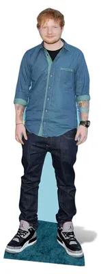 A full-body cardboard cutout of Ed Sheeran.
