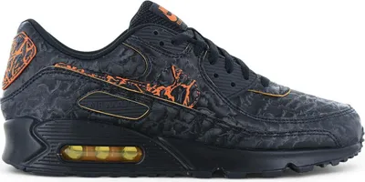 A side view of a black Nike Air Max 90 sneaker with orange accents.