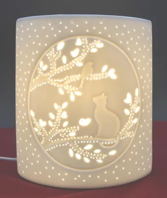 Productafbeelding van Gilde tafellamp, kattenmotief, porselein, wit, verpakkingseenheid 1, lengte 9 cm, breedte 17 cm, hoogte 20 cm. Artikelnummer: 32161. EAN: 4063387321614