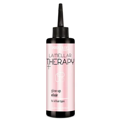 A bottle of hair elixir is shown against a white background.