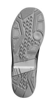 The sole of a black and silver safety shoe is shown against a white background.