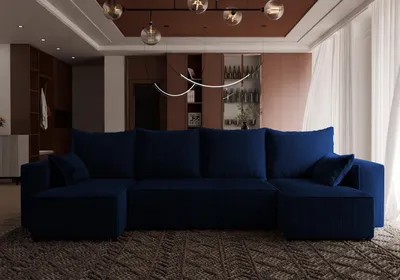 A spacious living room with a large blue sectional sofa as the focal point.