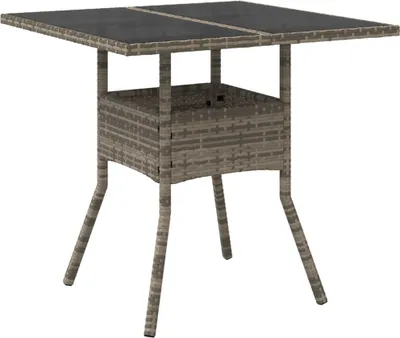 A square outdoor table with a glass top and a woven rattan base and legs, shown against a white background.