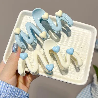 Image de Barrette à cheveux ondulée couleur crème pour femmes