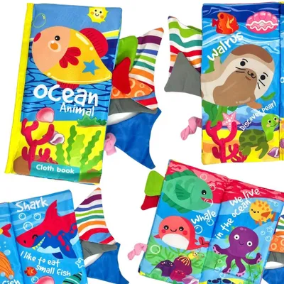 Produktbild von Woopie Baby Raschelndes Stoffbuch mit Meerestierschwänzen