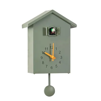 A cuckoo clock with a pendulum is shown against a white background.