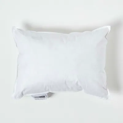 A white pillow is shown lying flat on a white background.