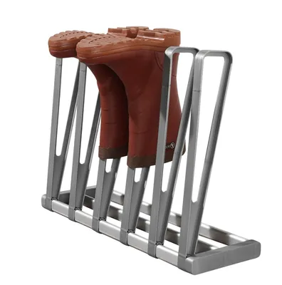 A boot rack holding two brown boots, shown against a white background.