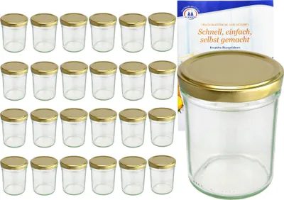A set of glass jars with gold lids and a recipe booklet.
