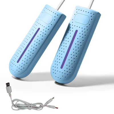 Two blue shoe dryers with purple accents and a white USB cable are displayed against a white background.