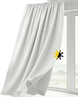 A white curtain hangs in front of a window, with a sun icon indicating light-blocking properties.