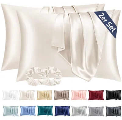 Produktbild von Set mit 2 Satin-Kissenbezügen, 40 x 80 cm, beige, seidenweich und pflegeleichter als Seidenkissenbezüge. Inklusive 2 Haargummis.