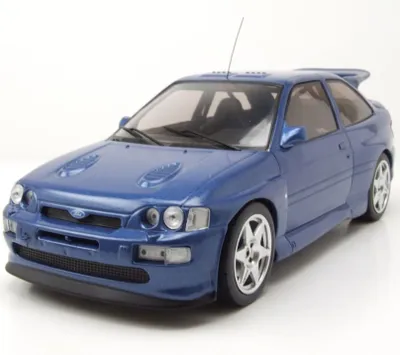 A blue Ford Escort RS Cosworth model car is shown from a three-quarter front angle against a white background.