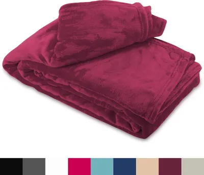 A folded plush blanket in a deep red color is displayed on a white background. Below the blanket, a row of color swatches is visible.