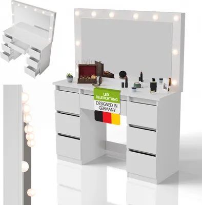 A white vanity table with a large mirror and LED lights, featuring several drawers and makeup items on top.