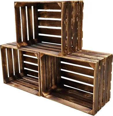 Three wooden crates stacked together.