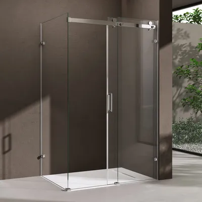 A modern glass shower enclosure with a sliding door, set against a textured wall and a glimpse of an outdoor garden.