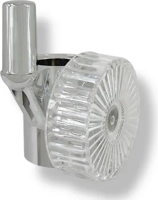 A close-up studio shot of a chrome and clear plastic shower head holder.