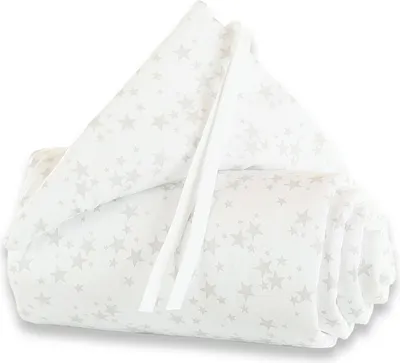 A folded baby nest with a star pattern on a white background.