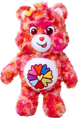 A stuffed toy bear with a colorful tie-dye pattern and a flower symbol on its belly.