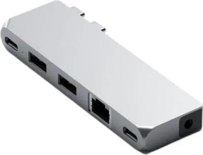 A silver USB hub with multiple ports is shown against a white background.