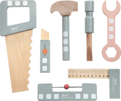 A collection of wooden toy tools arranged on a white background.