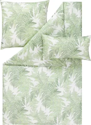 A flat lay of bedding with a fern leaf pattern.