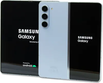 A Samsung Galaxy Z Fold 5 phone is shown next to its packaging.
