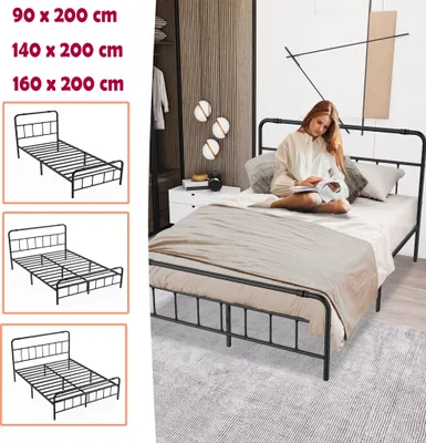 A woman is reading a book while sitting on a bed in a bedroom.