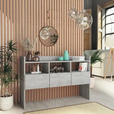 A modern living room with a wooden slatted wall, a grey sideboard, and decorative items.