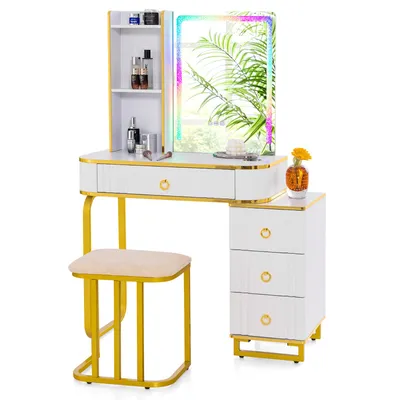 A white vanity table with gold accents and a stool, set against a white background.